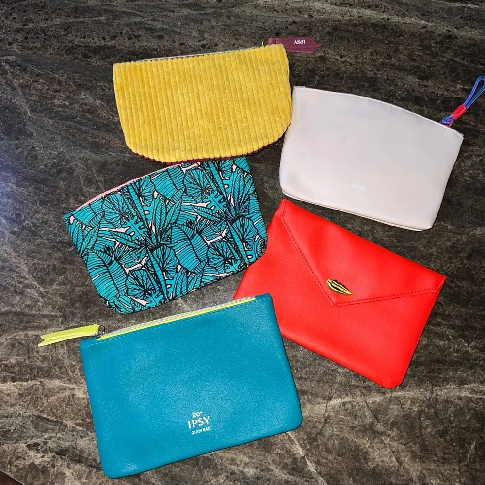 Ispy cosmetic bags 5 different prints all new not used